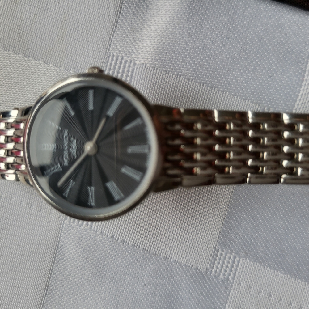 Lady's Silver Watch with Black Dial